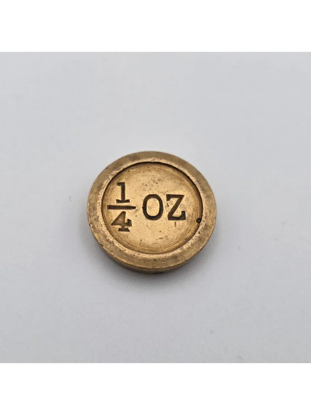 Solid Brass 1/4 Oz Coin-Shaped Weight With Stamped Markings